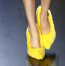 French label Celine debuted several furry shoes for their Spring 2013 collection. We might wear these neon yellow fuzzies . . . <br><br>Credit: Celine