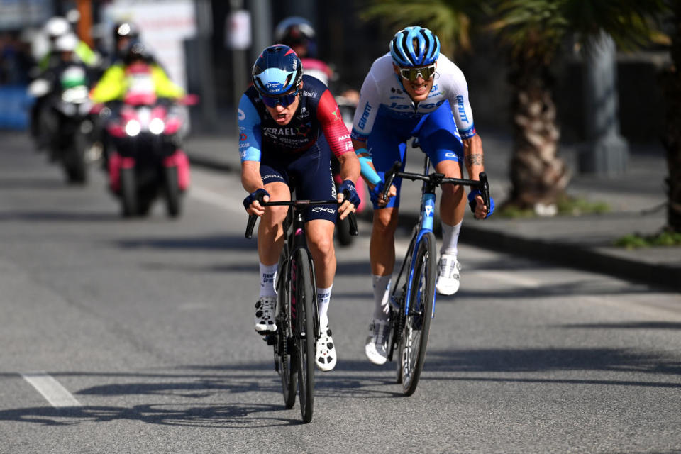 NAPLES ITALY  MAY 11 Simon Clarke of Australia and Team Israel  Premier Tech and Alessandro De Marchi of Italy and Team Jayco AlUla compete in the breakaway passing through Naples ity while fans cheer during the 106th Giro dItalia 2023 Stage 6 a 162km stage from Naples to Naples  UCIWT  on May 11 2023 in Naples Italy Photo by Tim de WaeleGetty Images