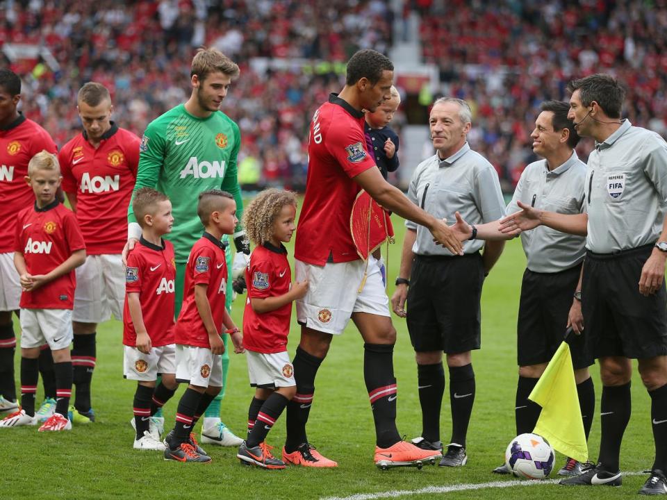 The defender with his three children at his testimonial match (Getty)