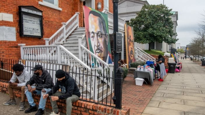 People sit near the Dexter Avenue King Memorial Baptist Church in Montgomery, Alabama, during a rally at the Alabama State Capitol last March commemorating “Bloody Sunday.” Alabama’s Black Belt has been designated as a National Heritage Area, qualifying it to receive up to $1 million in federal funds each year to conserve and preserve historic sites. (Photo: Brandon Bell/Getty Images)