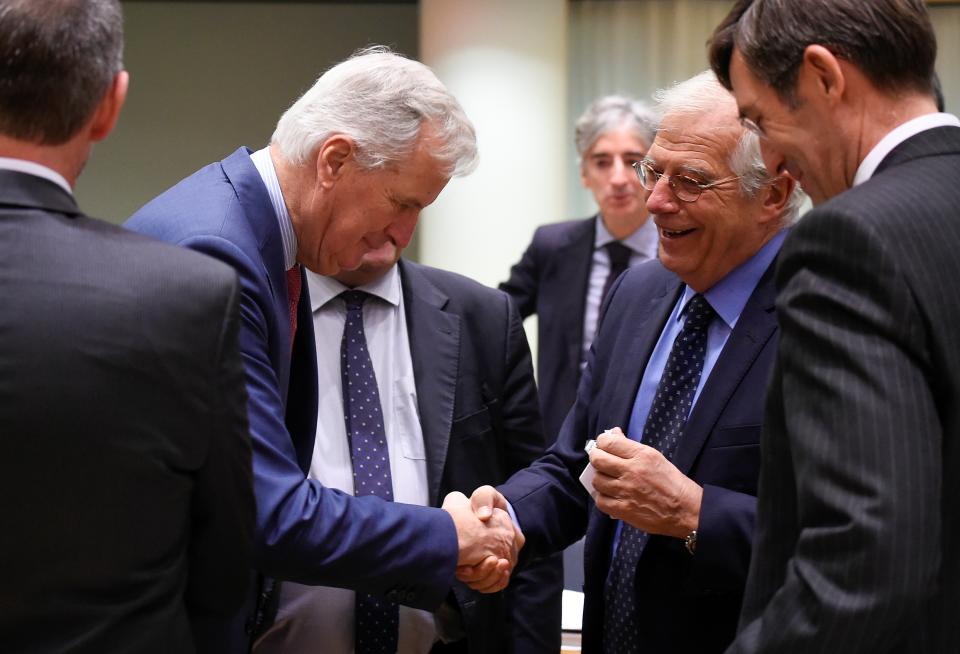 EU chief negotiator Michel Barnier shaking hands with Spanish foreign minister Josep Borrell at a meeting in Brussels on Monday (Getty)