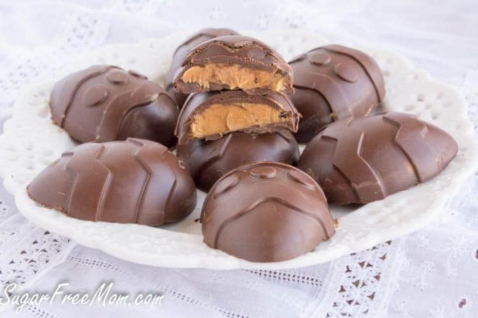<p>Sugar Free Mom</p><p>Sugar-Free Chocolate Peanut Butter Easter Eggs are an easy no-bake recipe that’s keto, low-carb, gluten- and dairy-free! Most fabulous peanut butter Easter treat ever!</p><p><a href="https://www.sugarfreemom.com/recipes/sugar-free-chocolate-peanut-butter-easter-eggs-dairy-free/" rel="nofollow noopener" target="_blank" data-ylk="slk:Get the recipe!;elm:context_link;itc:0;sec:content-canvas" class="link ">Get the recipe!</a></p>