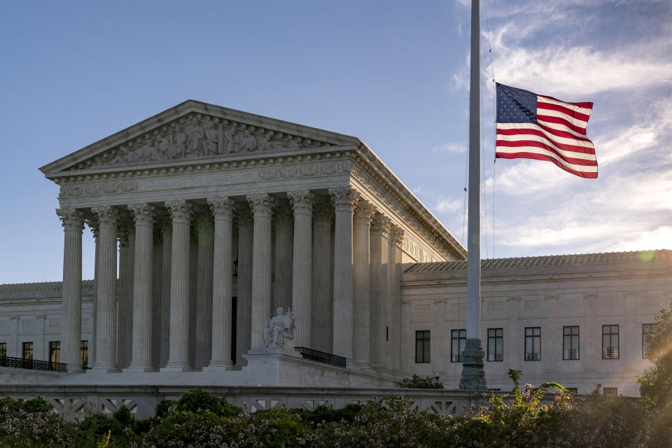 The flag flies at half-staff at the Supreme Court on the morning after the death of Justice Ruth Bader Ginsburg, 87, Saturday, Sept. 19, 2020 in Washington. (AP Photo/J. Scott Applewhite)