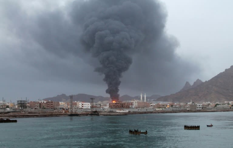 Fire and smoke rises from the Aden oil refinery following a reported shelling attack by Shiite Huthi rebels in the embattled southern city of Aden on July 13, 2015