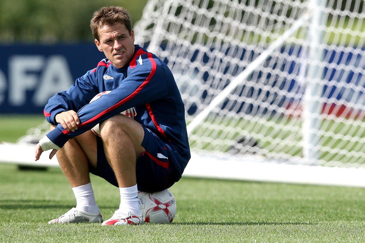 Former England striker Michael Owen announced his retirement in 2013 (Martin Rickett/PA) (PA Archive)