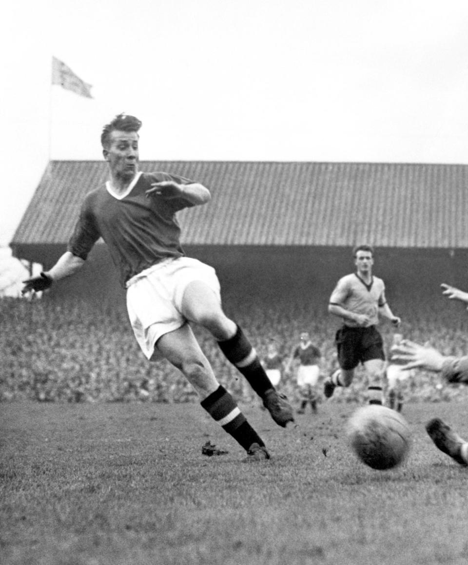 In action as a teenager for Manchester United, March 1957 (PA)
