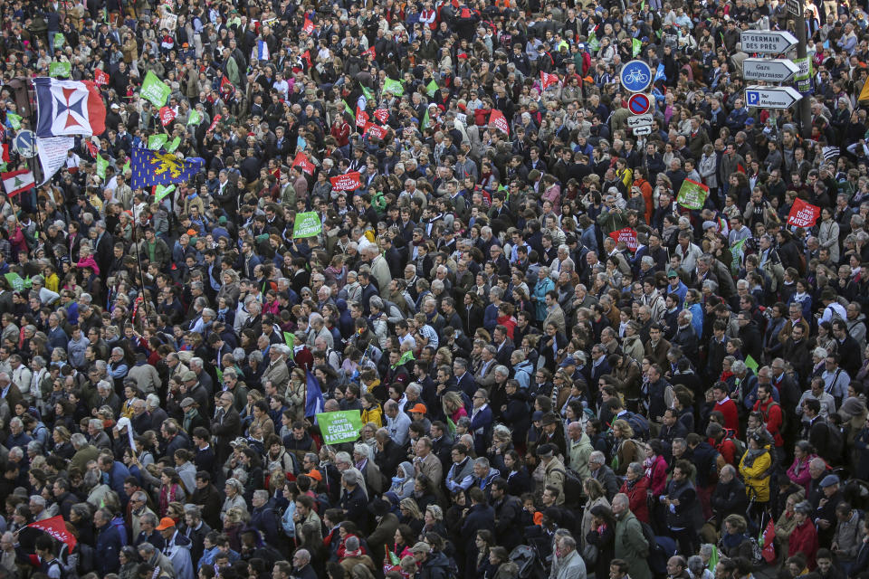 Conservative activists gather to protest in Paris, Sunday Oct. 6, 2019, against a French bill that would give lesbian couples and single women access to in vitro fertilization and related procedures. Traditional Catholic groups and far-right activists organized Sunday's protest, arguing that it deprives children of the right to a father. (AP Photo/Rafael Yaghobzadeh)