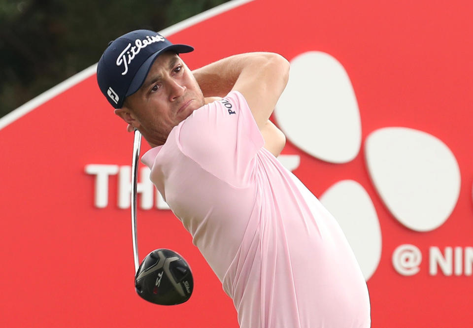 Justin Thomas of the United States watches his shot on the 18th hole during the final round of the CJ Cup PGA golf tournament at Nine Bridges on Jeju Island, South Korea, Sunday, Oct. 20, 2019. (Park Ji-ho/Yonhap via AP)