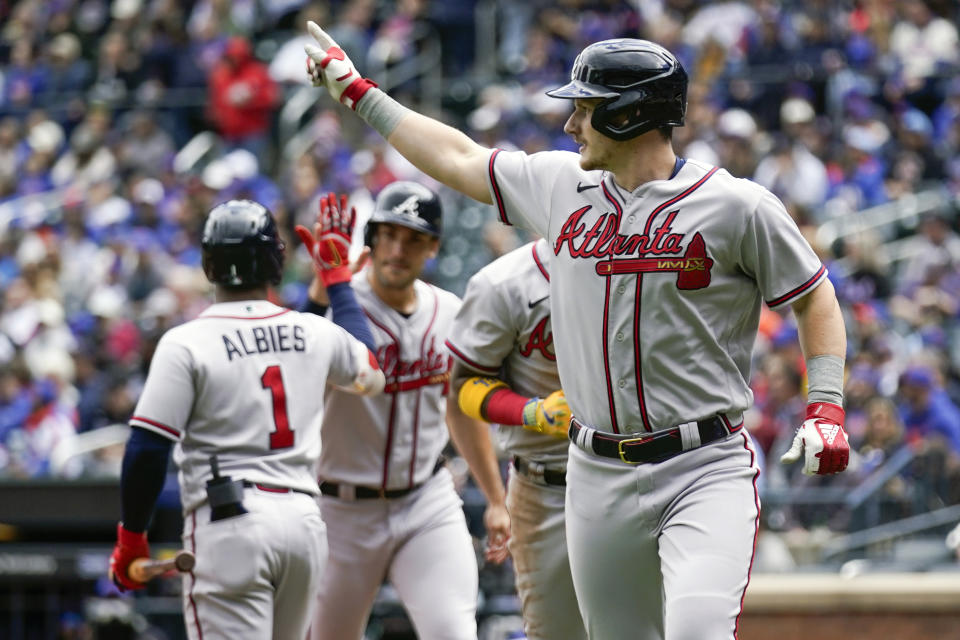 Atlanta Braves' Sean Murphy, right, reacts after hitting a three-run home run during the first inning of the first baseball game of a doubleheader against the New York Mets at Citi Field, Monday, May 1, 2023, in New York. (AP Photo/Seth Wenig)