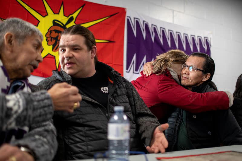 First Nations members of the Tyendinaga Mohawk Territory and Wet'suwet'en Nation speak at a news conference at the Mohawk Community Centre in Tyendinaga