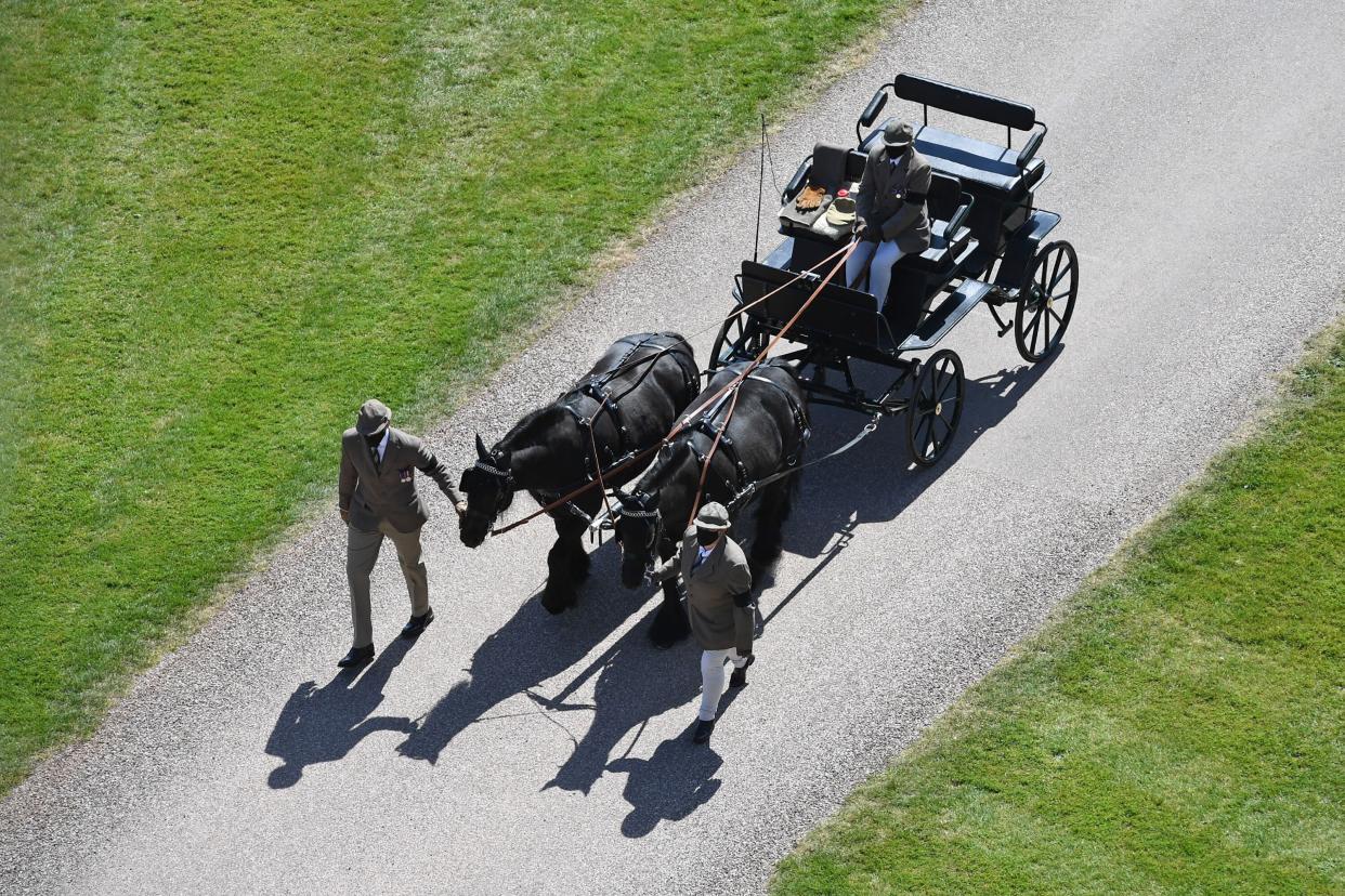 Ponies pull the Duke of Edinburgh's driving carriage at Windsor Castle.