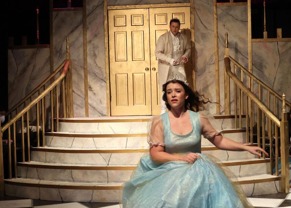 As midnight strikes, Rachel Walman, as Cinderella, flees the castle of Prince Charming, played by DJ Kostka, in the Academy of Performing Arts' "Cinderella," through Dec. 23.