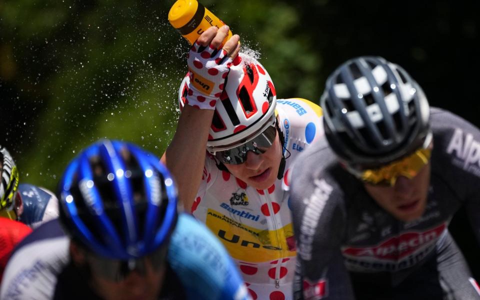 Jonas Abrahamsen cools off while riding in the breakaway