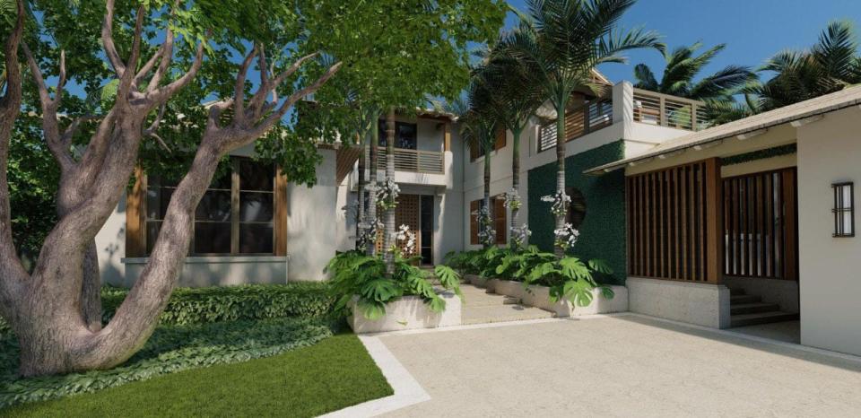 A rendering shows the front of a house designed for a lot at 1265 N. Lake Way in Palm Beach. The lakeside lot is being marketed with the town-approved house plans for $37.95 million.