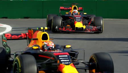 Formula One - F1 - Azerbaijan Grand Prix - Baku, Azerbaijan - June 23, 2017. Red Bull Racing's Daniel Ricciardo (back) and Red Bull Racing's Max Verstappen drive during the second practice session. REUTERS/David Mdzinarishvili