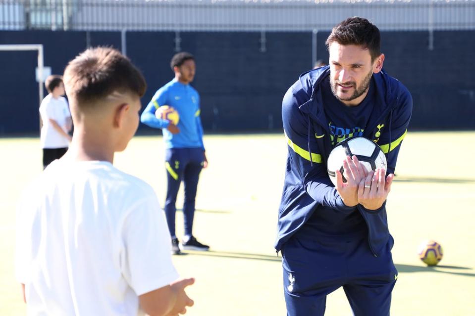 Hugo Lloris on a visit to Duke’s Aldridge Academy (Tottenham Hotspur FC via Getty Images)