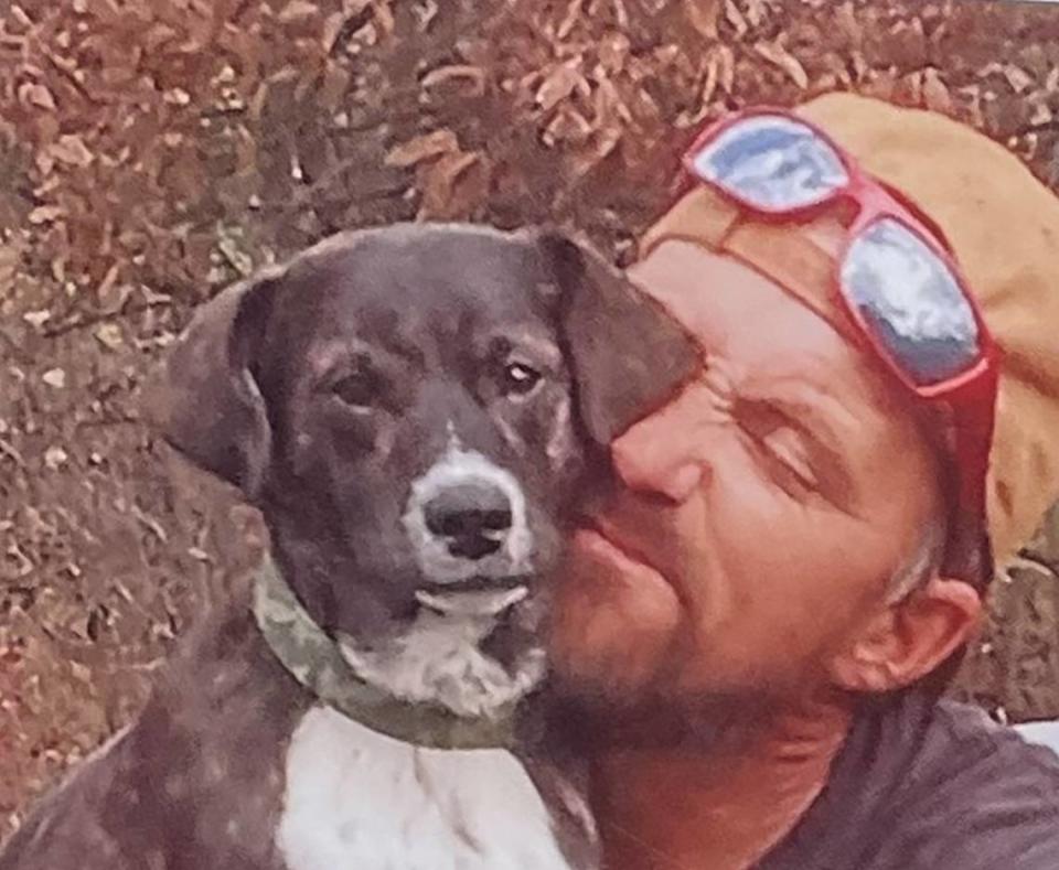 Jake Monteer and his dog Lucky are shown in this undated photo. Monteer was killed in March when a driver fleeing from police in Independence struck the motorcyle he and a friend were on. Both were killed.