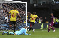 <p>Manchester City’s Sergio Aguero, right, taps in his side’s second goal against Watford during their English Premier League soccer match at Vicarage Road in Watford, England, Saturday Sept. 16, 2017. (Nigel French/PA via AP) </p>