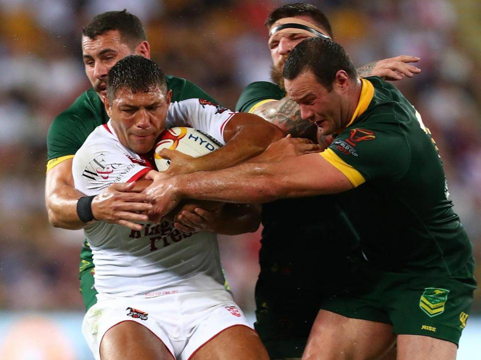 Ryan Hall is tackled by three Australian tacklers (Getty)