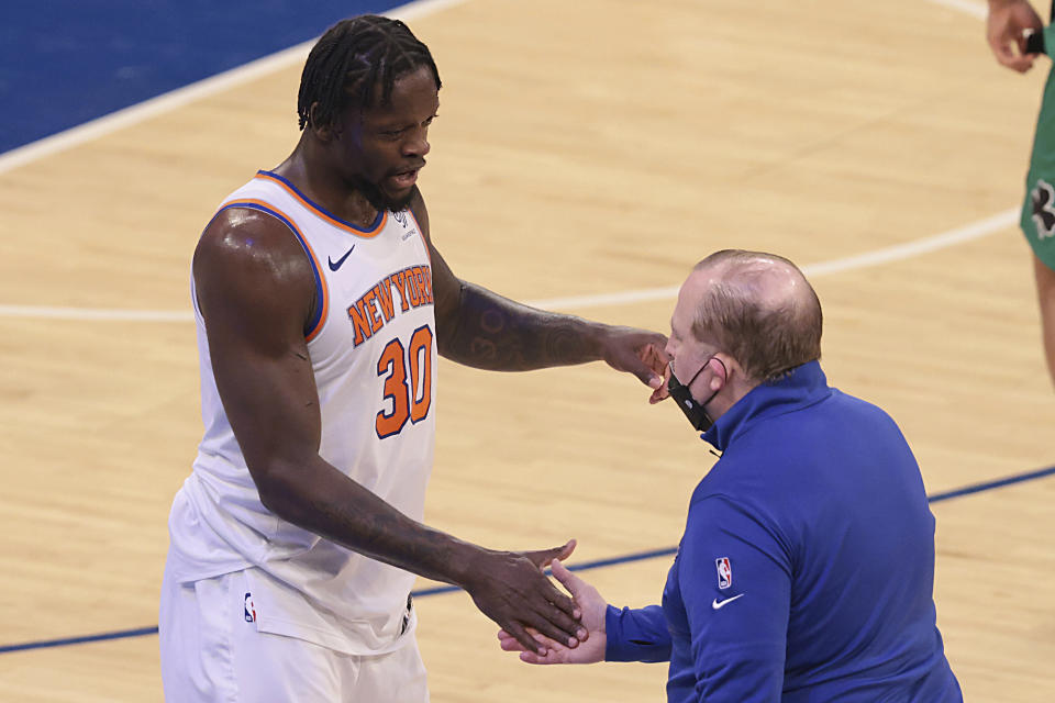 New York Knicks forward Julius Randle (30) celebrates with head coach Tom Thibodeau after an NBA basketball game against the Boston Celtics in New York, Sunday, May 16, 2021. (Vincent Carchietta/Pool Photo via AP)