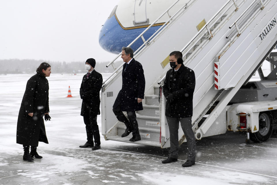 U.S. Secretary of State Antony Blinken, second from right, disembarks from his plane upon arriving in Tallinn, Estonia, on Tuesday, March 8, 2022. Blinken visited Lithuania and Latvia on Monday to calm any fears that they and Estonia, which he is visiting Tuesday, have about their security. The three Baltic countries, which endured decades of Soviet occupation before regaining their independence in 1991, are members of the EU and NATO. (Olivier Douliery/Pool Photo via AP)