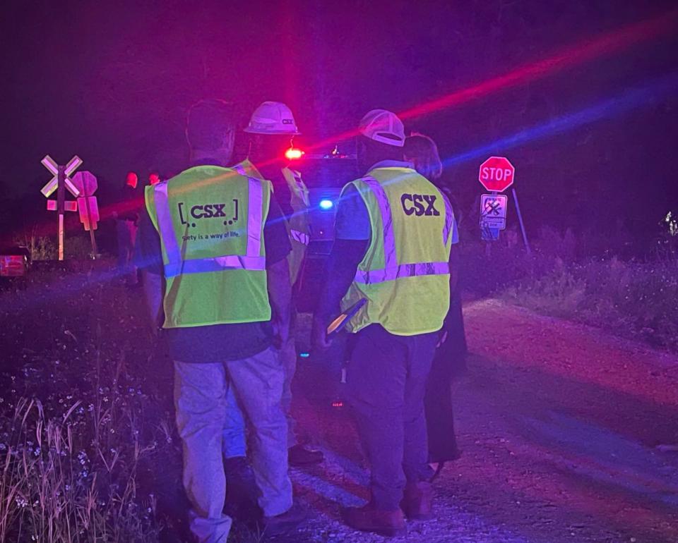 PHOTO: Workers gather near the site where a train crashed into an SUV in Hillsborough County, Florida, on Saturday, Sept. 23, 2023. (Hillsborough County Sheriff's Office)