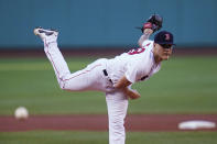 Boston Red Sox starting pitcher Tanner Houck delivers during the first inning of the second baseball game of a doubleheader against the Toronto Blue Jays at Fenway Park, Wednesday, July 28, 2021, in Boston. (AP Photo/Charles Krupa)