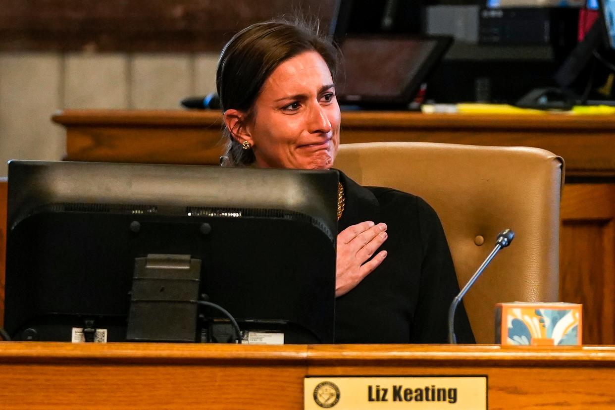 Council member Liz Keating, the sole Republican council member and only member not reelected, reacts and puts her hand over her heart while Cincinnati Mayor Aftab Pureval thanks her for her service during a Cincinnati City Council meeting on Wednesday, Nov. 8, 2023, at Cincinnati City Hall in Downtown Cincinnati. Keating lost her reelection Tuesday, Nov. 7, 2023, to Democrat Anna Albi.