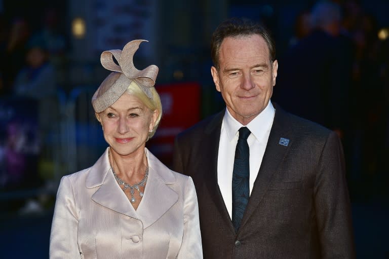 British actress Helen Mirren (L) and US actor Bryan Cranston pose as they arrive for the European premiere of the film "Trumbo" during the BFI London Film Festival in Leicester Square on October 8, 2015