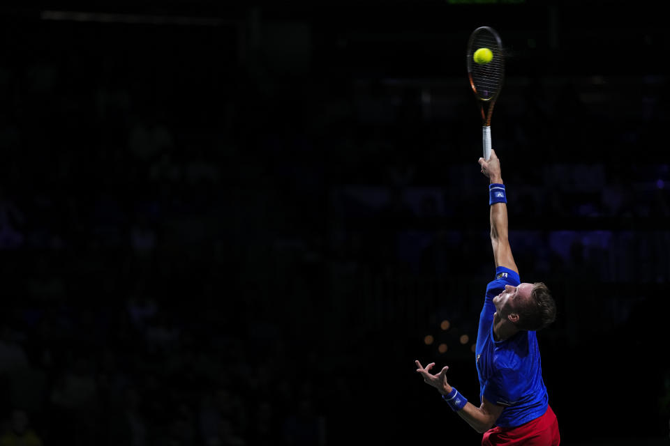 Jiri Lehecka of the Czech Republic serves against Australia's Alex De Minaur during a Davis Cup quarter-final tennis match between Australia and Czech Republic in Malaga, Spain, Wednesday, Nov. 22, 2023. (AP Photo/Manu Fernandez)