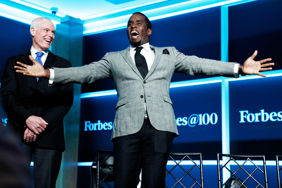 <p>The man of many names — Puff Daddy, Diddy, Puffy, whatever you call him — was absolutely thrilled to be at the Forbes Media Centennial Celebration in New York. We’re guessing he was thinking of his status as <a rel="nofollow" href="https://www.yahoo.com/gma/sean-diddy-combs-forbes-highest-paid-celebrity-235203913--abc-news-music.html" data-ylk="slk:the most highly paid entertainer;elm:context_link;itc:0;sec:content-canvas;outcm:mb_qualified_link;_E:mb_qualified_link;ct:story;" class="link  yahoo-link">the most highly paid entertainer</a> in the world this year, according to the magazine, at this very moment. (Photo: Taylor Hill/Getty Images) </p>