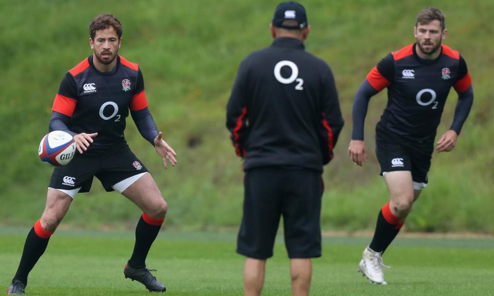 Danny Cipriani, left, and Elliot Daly in training as Eddie Jones watches on.