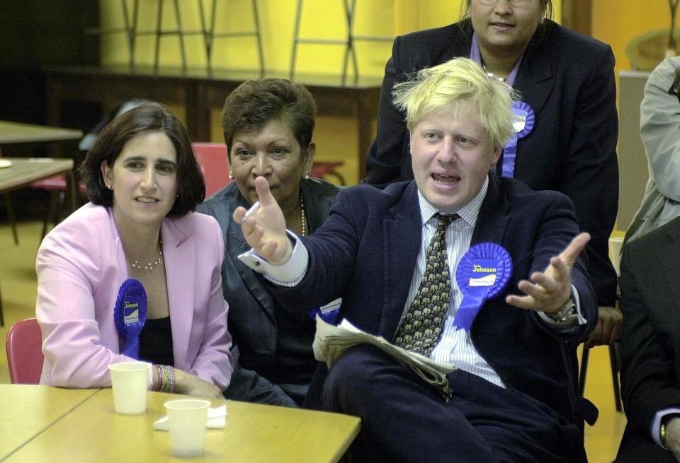 Boris Johnson watches the election results with his wife Marina (L), at the count in Watlington, Oxfordshire, after winning the Henley seat for the Conservatives in the 2001 General Election. The seat was Michael Heseltine's, who has stepped down at this election.