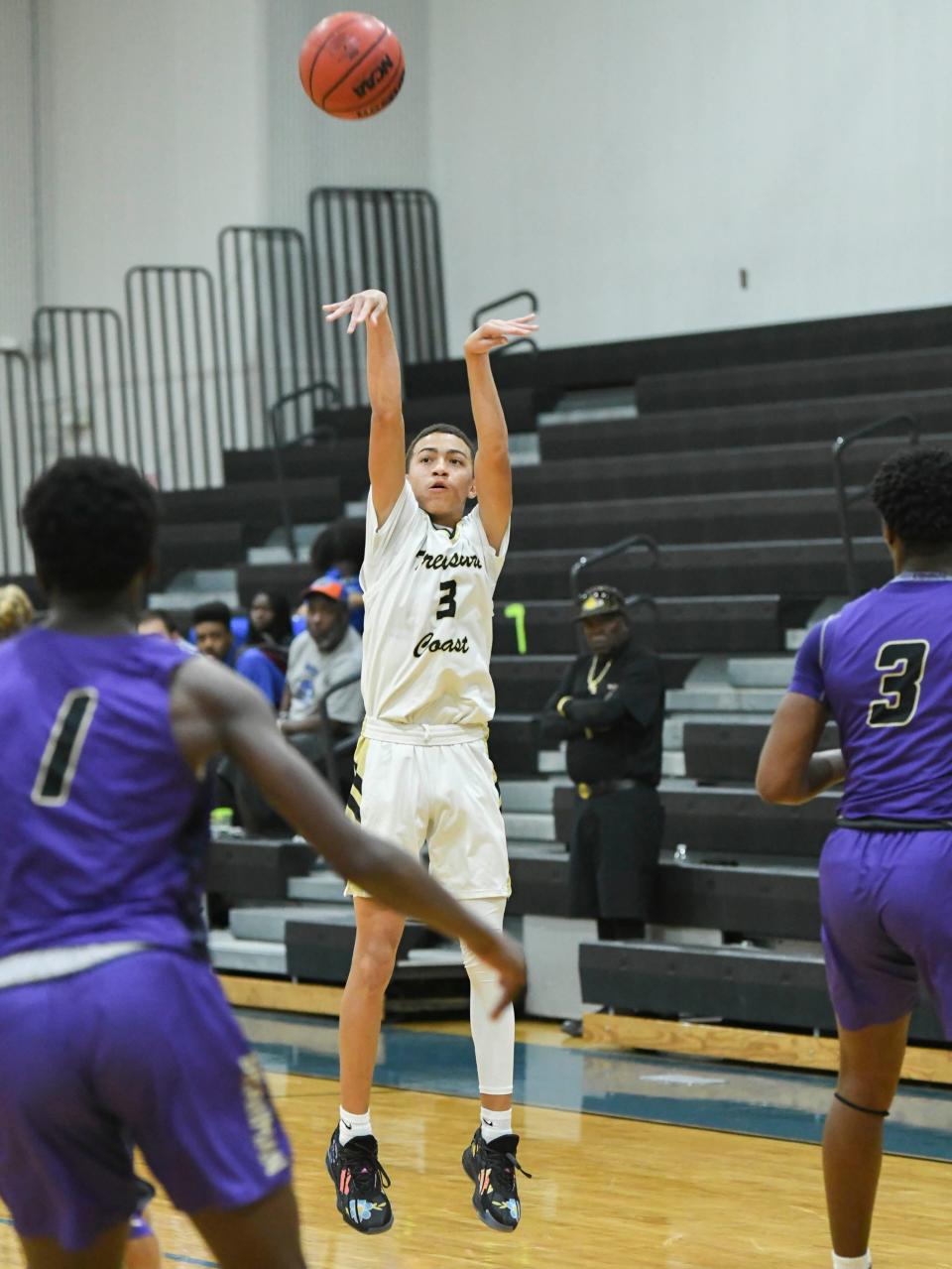 Tyson Wilson of Treasure Coast takes a shot against the Okeechobee Brahmans in the finals of the Heritage Holiday basketball tournament Wednesday, Dec. 29, 2021 in Palm Bay. Craig Bailey/FLORIDA TODAY via USA TODAY NETWORK