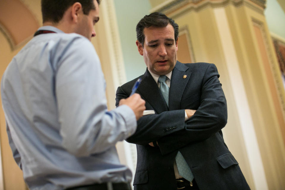WASHINGTON, DC - MARCH 22:  U.S. Sen. Ted Cruz (R-Texas) talks with a reporter outside the Senate chamber on Capitol Hill March 22, 2013 in Washington, DC. The Senate voted on amendments to the budget resolution on Friday afternoon and into the evening. (Photo by Drew Angerer/Getty Images)