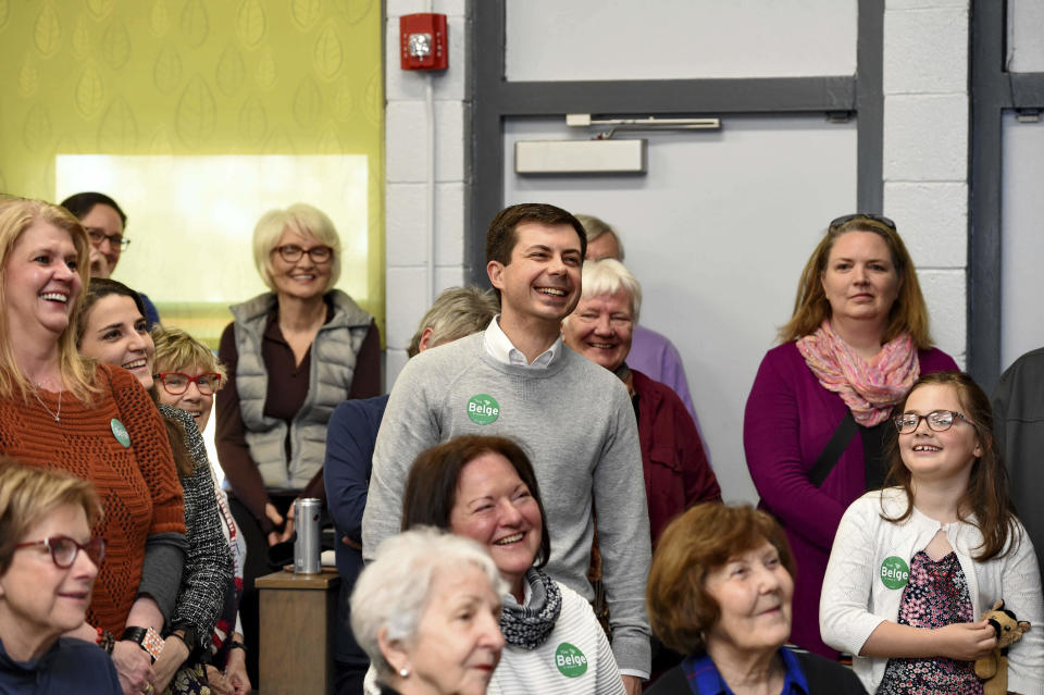 In this March 23, 2019, photo, South Bend Mayor Pete Buttigieg laughs before he speaks to a crowd about his presidential run during the Democratic monthly breakfast at the Circle of Friends Community Center in Greenville, S.C. Buttigieg was the longest of long shots when he announced a presidential exploratory committee in January. But now the underdog bid is gaining momentum, and Buttigieg can feel it. (AP Photo/Richard Shiro)