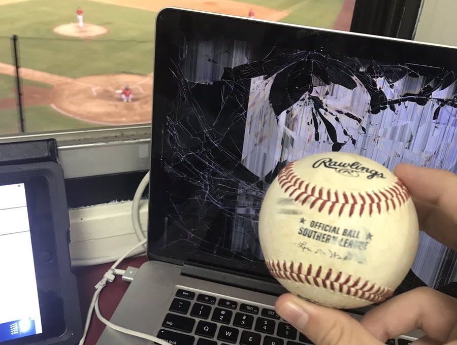 Roger Hoover’s laptop was destroyed by a baseball while he was on the air calling a minor league game. (Twitter/@Roger_Hoover)