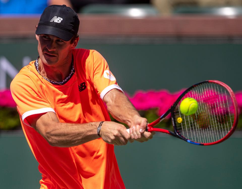 Tommy Paul of the United States hits to Hubert Hurkacz of Poland during their third-round match at the BNP Paribas Open at the Indian Wells Tennis Garden in Indian Wells, Calif., Monday, March 13, 2023. 