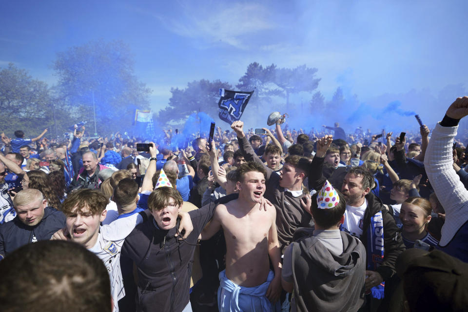 Ipswich Town fans react, ahead of the English Championship soccer match between Ipswich Town and Huddersfield Town at Portman Road, in Ipswich, Saturday, May 4, 2024. (Zac Goodwin/PA via AP)