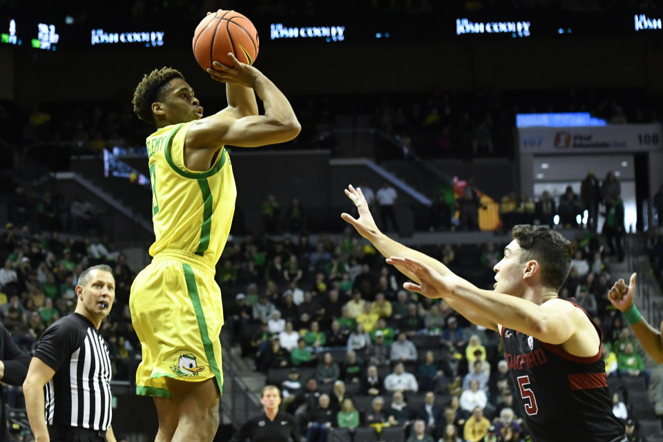 Oregon guard Keeshawn Barthelemy (3) shoots over Stanford guard Michael O'Connell (5) during the first half of an NCAA college basketball game Saturday, March 4, 2023, in Eugene, Ore. (AP Photo/Andy Nelson)