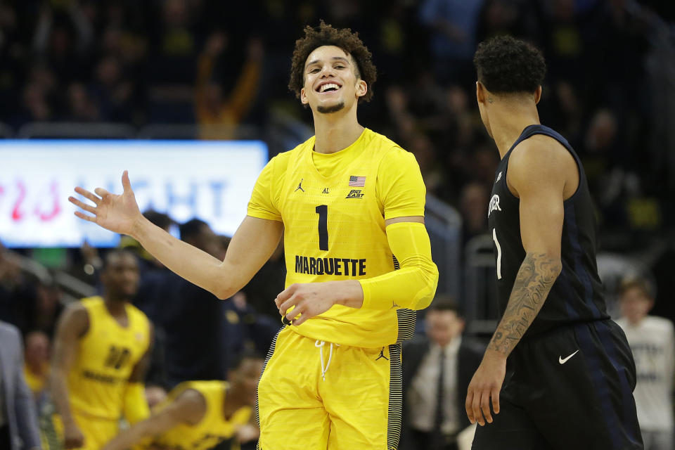 Marquette's Brendan Bailey reacts after making a basket during the second half of an NCAA college basketball game against Butler, Sunday, Feb. 9, 2020, in Milwaukee. (AP Photo/Aaron Gash)