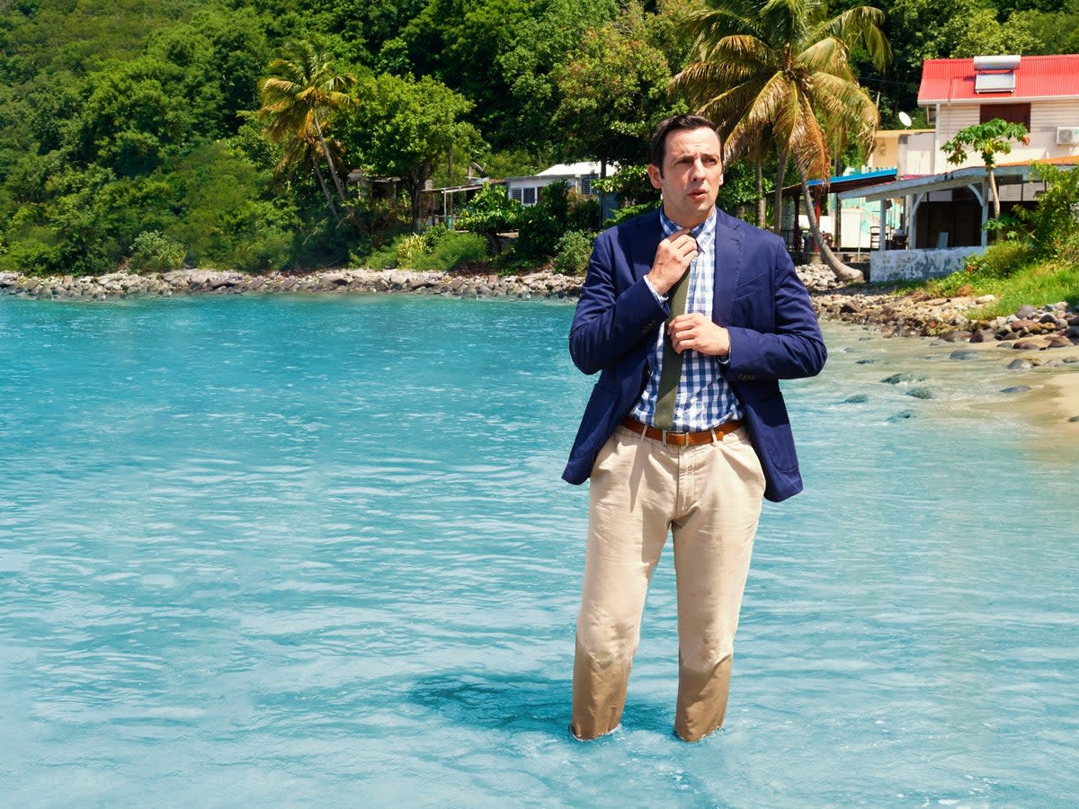 Soggy sleuth: Ralf Little, the latest lead detective in ‘Death in Paradise’  (BBC / Red Planet / Amelia Troubridge)