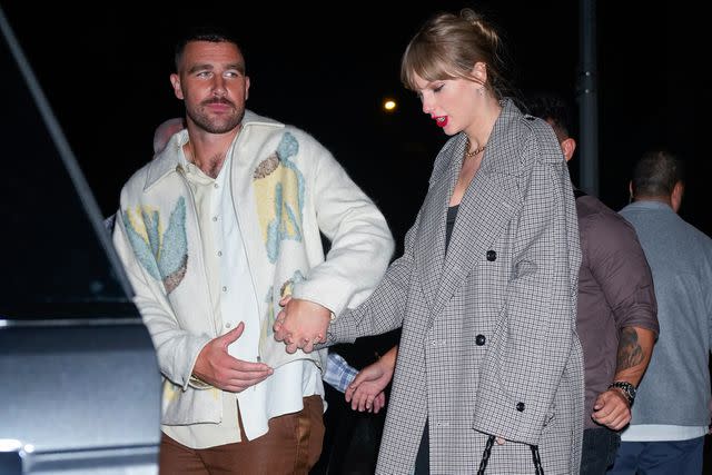 <p>Gotham/GC Images</p> Travis Kelce and Taylor Swift depart the SNL Afterparty