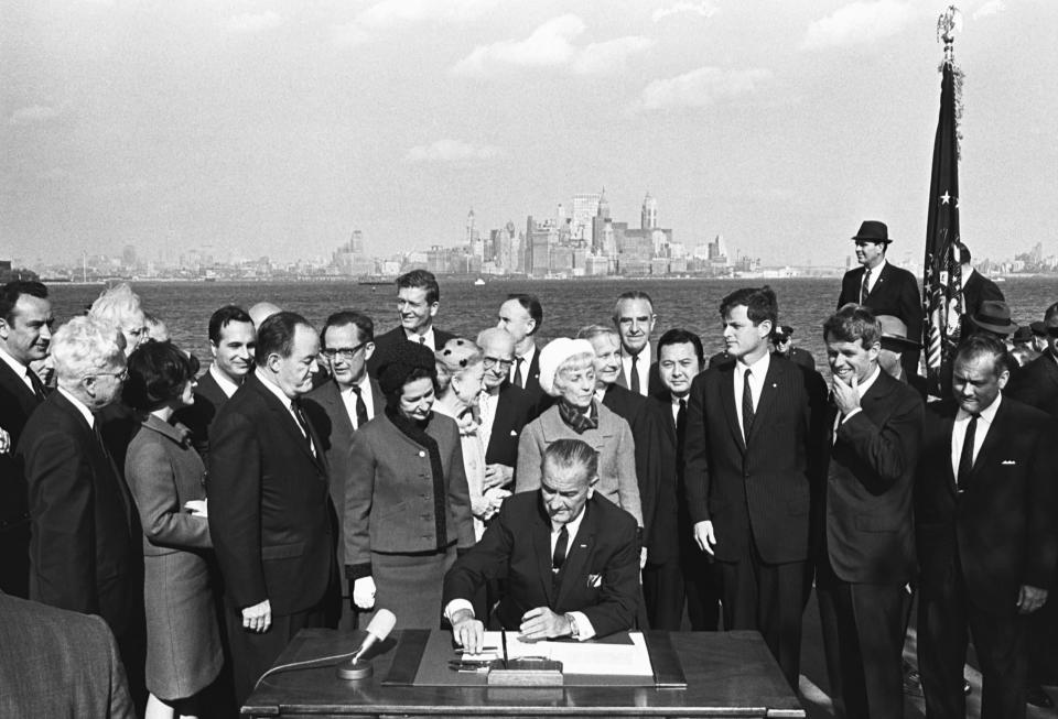 President Johnson Signing Immigration Bill on Liberty Island (Corbis / via Getty Images)