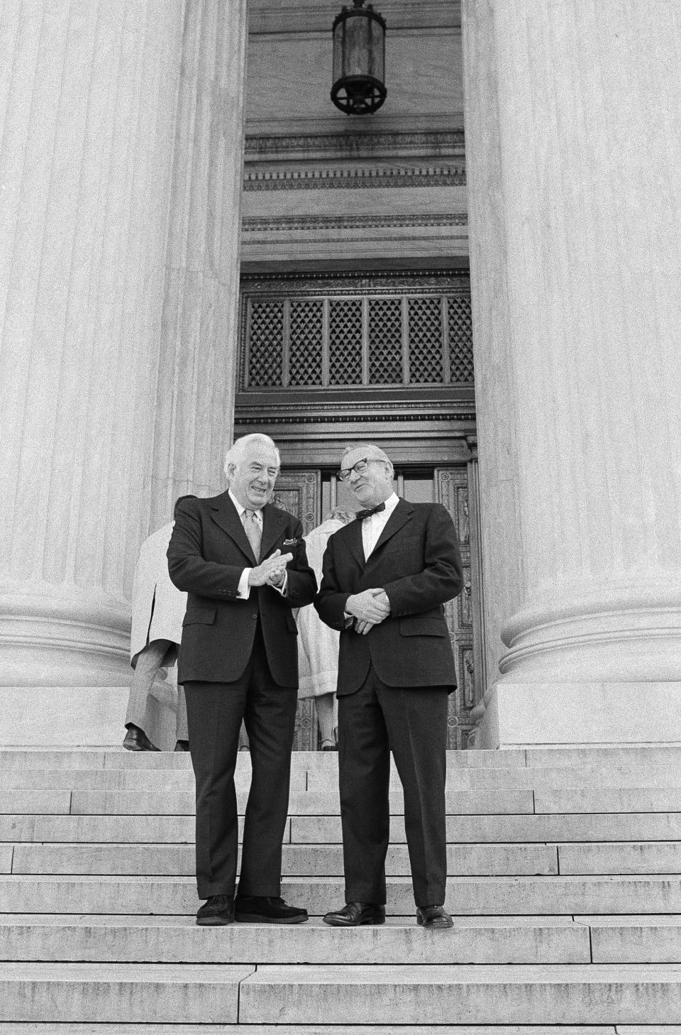 Supreme Court Chief Justice Warren Burger, left, chats with John Paul Stevens on the steps of the court prior to Stevens' swearing-in as its 101st justice in 1975.