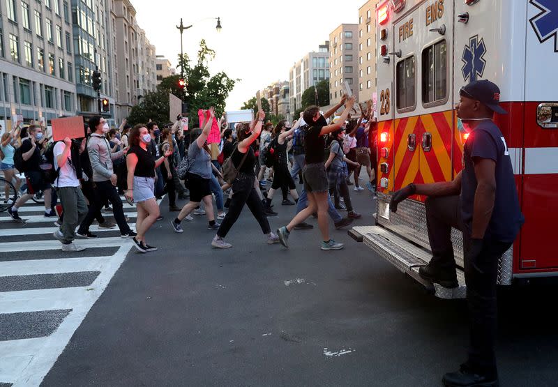 Protesters take part in an anti-police brutality march in Washington