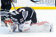 New Jersey Devils goaltender Kaapo Kahkonen (31) kneels on the ice after conceding a goal to Nashville Predators left wing Anthony Beauvillier during the first period of an NHL hockey game in Newark, N.J., Sunday, April 7, 2024. (AP Photo/Peter K. Afriyie)