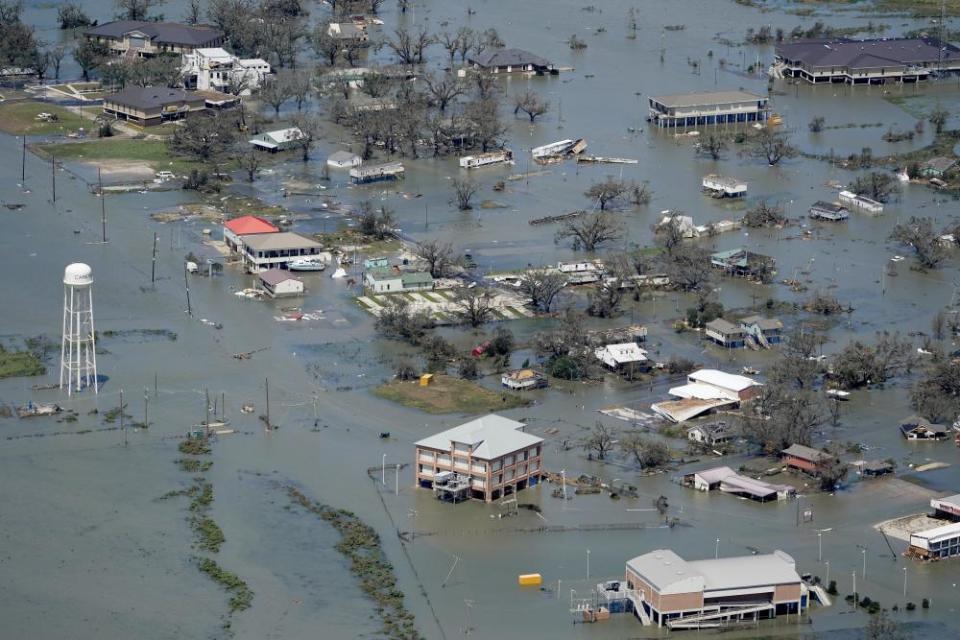 Buildings and homes are flooded in the aftermath of Hurricane Laura near Lake Charles, Louisiana.