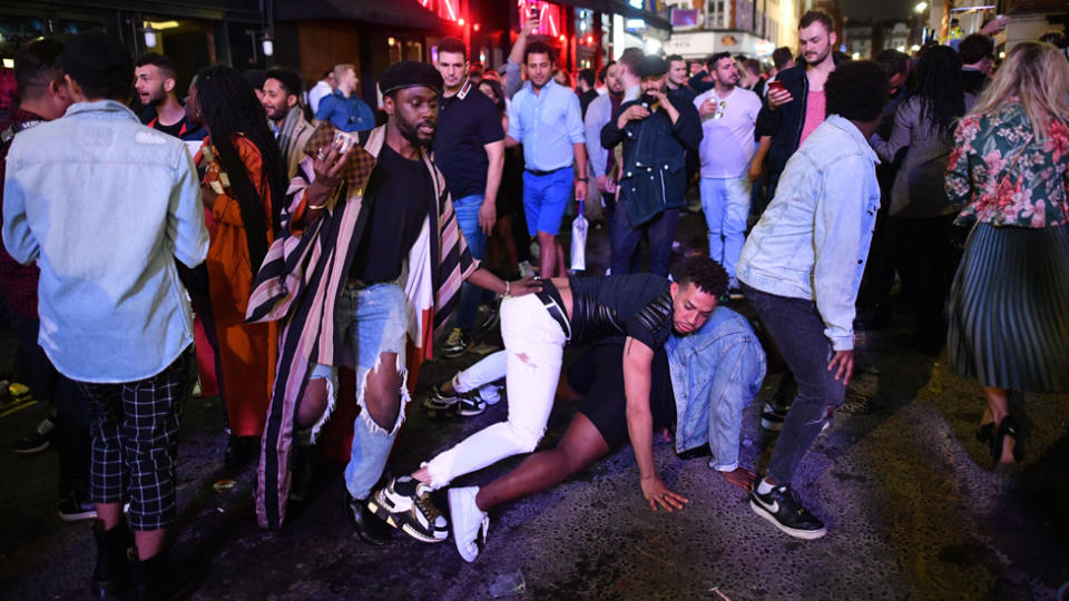 Scenes outside of pubs told a different story with crowds ignoring social distancing and police called in to control rowdy crowds.