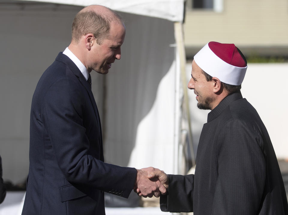 Britain's Prince William, left, meets Imam Gamal Fouda of Masjid Al Noor at the Al Noor mosque during a visit to the mosque in Christchurch, New Zealand, Friday, April 26, 2019. Prince William visited the one of the mosques where 50 people were killed and 50 others wounded in a March 15 attack by a white supremacist. (Joseph Johnson/Pool Photo via AP)